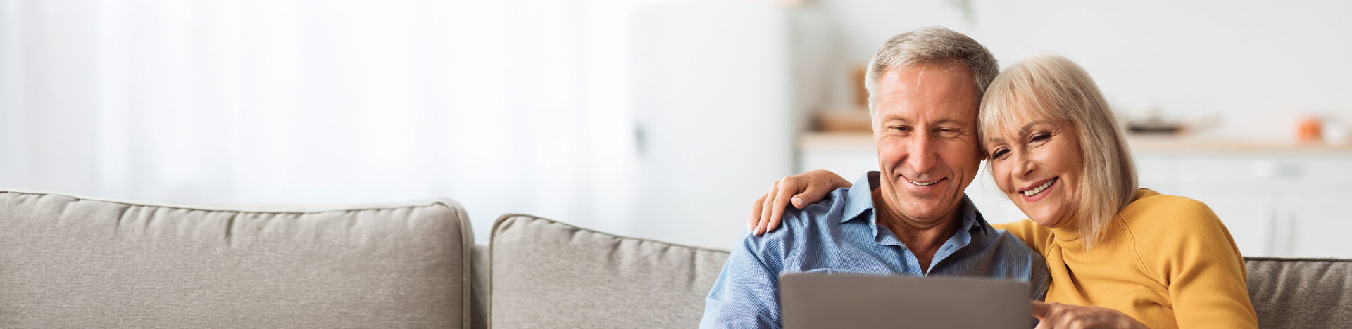 Couple looking at laptop